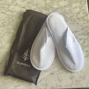 Four season’s house slippers size largerge white. New never worn with bag